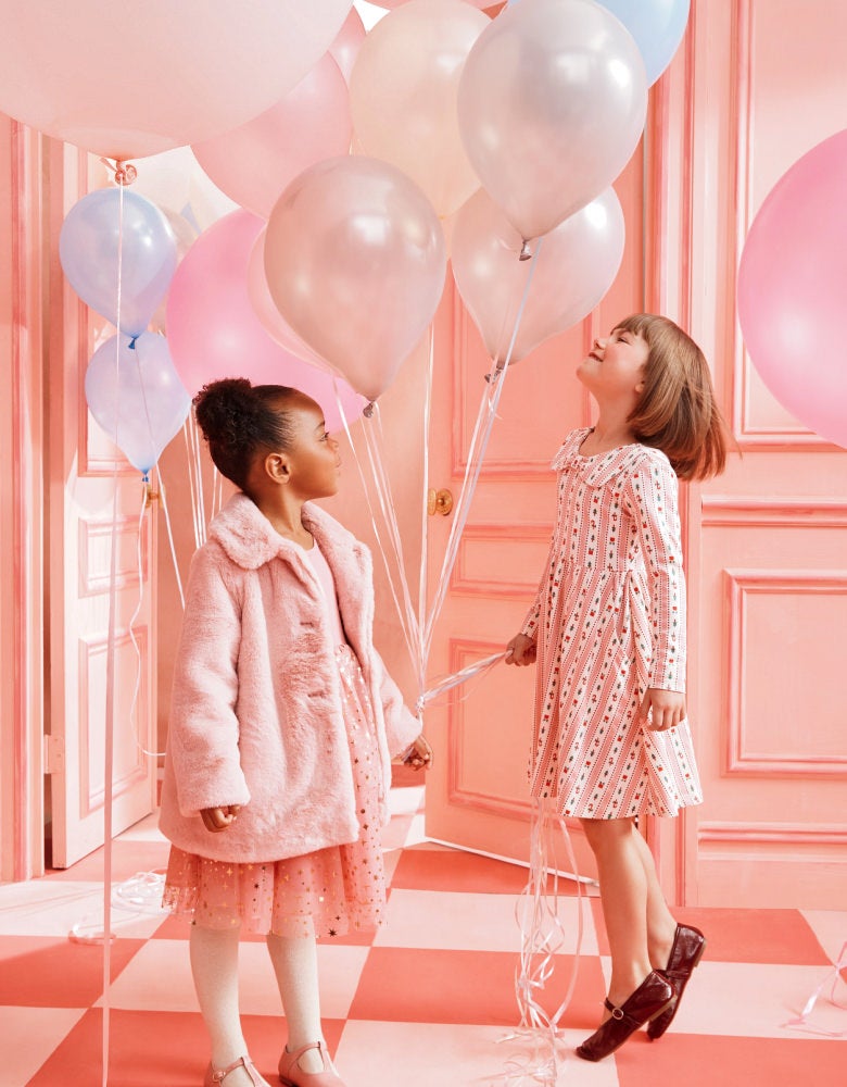 NEW joyful dresses
made to celebrate, made to last.
girls in festive pink party dresses