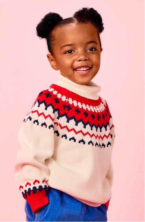 new cozy sweaters new cozy sweaters
girl in red and cream fair isle sweater
