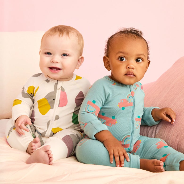 baby sleepers mobile banner two babies wearing baby sleepers