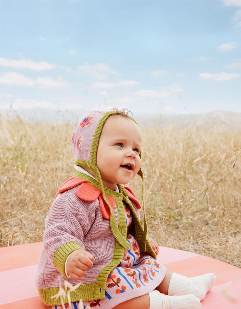 baby's first cozy season baby in fall clothes