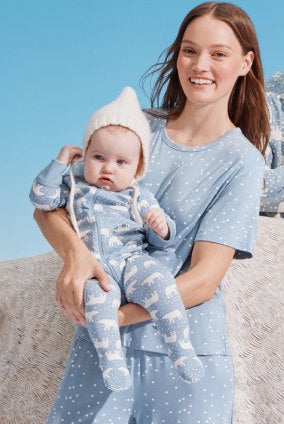 baby in blue polar bear sleeper