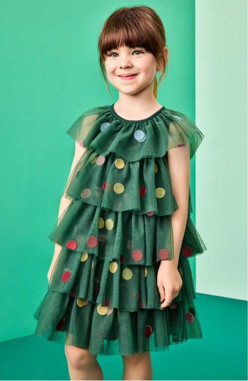 girl in green holiday tulle dress 