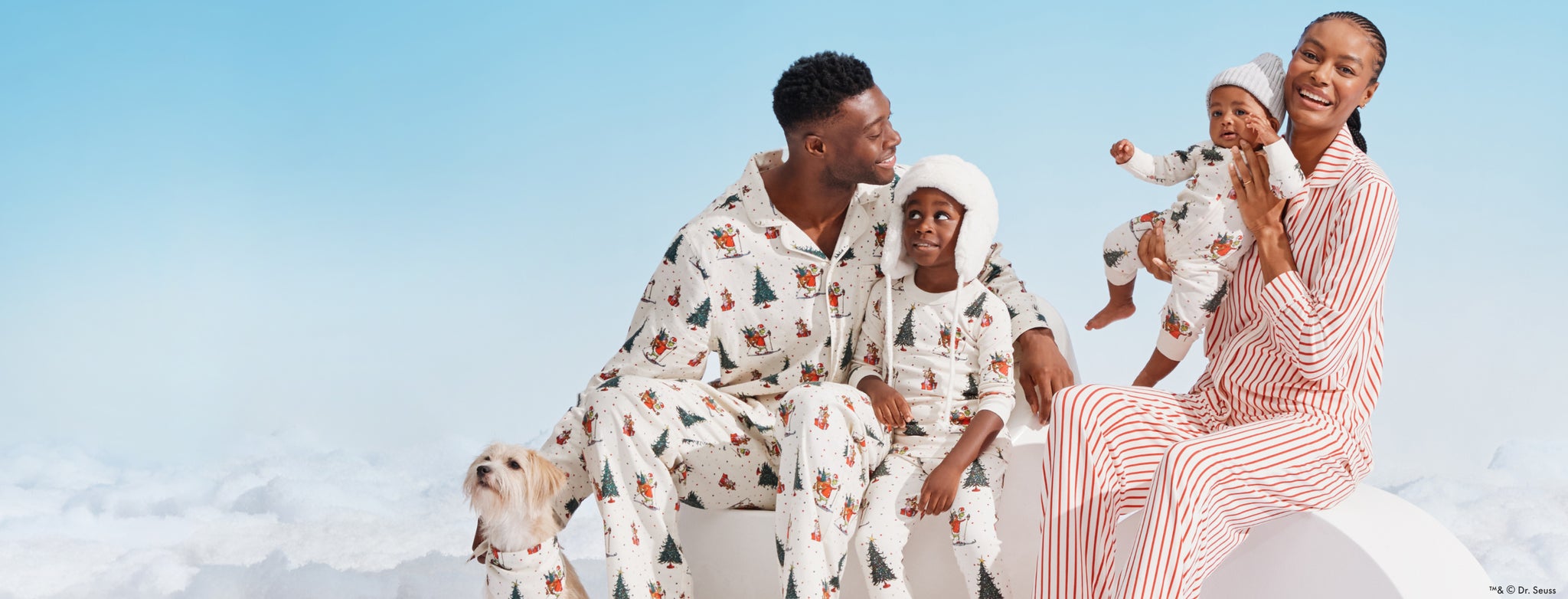 Dr. Seuss The Grinch
new & only at hanna!
family in mix & match Grinch PJs with dog