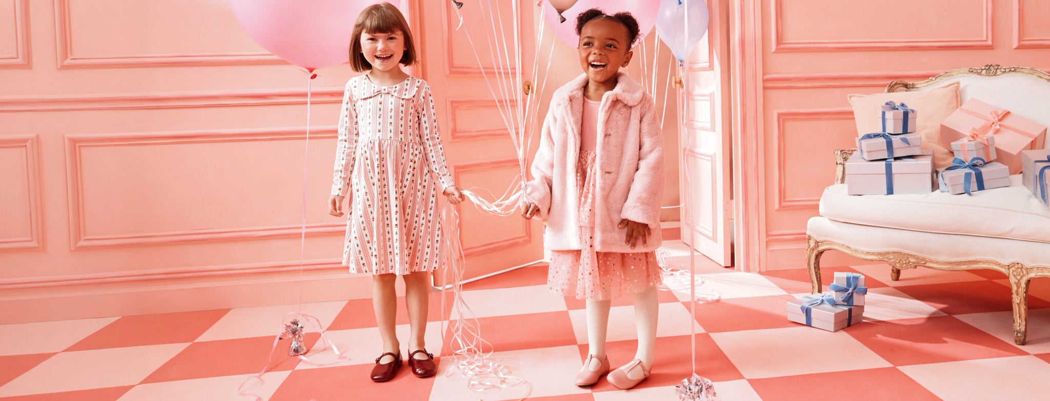 NEW joyful dresses
made to celebrate, made to last.
girls in festive pink party dresses